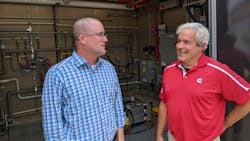 Brian R Wilson (left) and Matt Abdallah of Cummins discuss power testing at the Cummins Technical Center in Columbus, Indiana. Brian R Wilson (left) and Matt Abdallah of Cummins discuss power testing at the Cummins Technical Center in Columbus, Indiana.