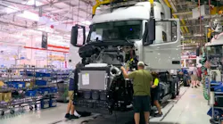 Line workers assemble a Volvo truck at the company's New River Valley plant in Dublin, Virginia.