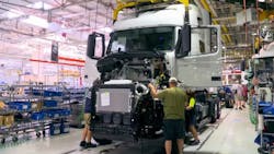 Line workers assemble a Volvo truck at the company's New River Valley plant in Dublin, Virginia. Line workers assemble a Volvo truck at the company's New River Valley plant in Dublin, Virginia.