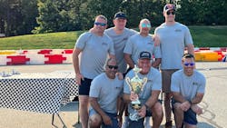 Advantage Truck Group and Robert B. Our's winning team of first responders from the Mashpee police and fire departments (from left): Eric Hersey, Kristian Oberg, Bryan Derochea, Nick Stecchi, Will Cuozzo, Advantage Truck Group President and CEO Kevin Holmes (with trophy) and Tyler Cuozzo. Advantage Truck Group and Robert B. Our's winning team of first responders from the Mashpee police and fire departments (from left): Eric Hersey, Kristian Oberg, Bryan Derochea, Nick Stecchi, Will Cuozzo, Advantage Truck Group President and CEO Kevin Holmes (with trophy) and Tyler Cuozzo.