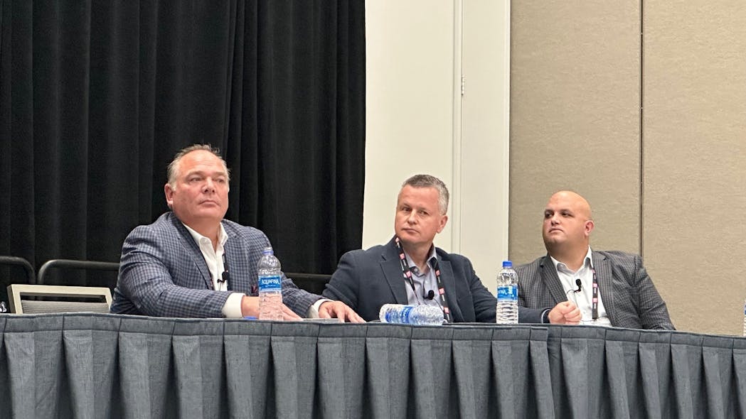 From left, Steve Smith, senior industry advisor at DDC FPO and president of Smith Transportation Consulting Services; Chris Henry, COO of KSMTA Canada; and Zack King, former EVP and CFO of USA Truck, discuss managing cashflow at ATA&apos;s MCE 2022.