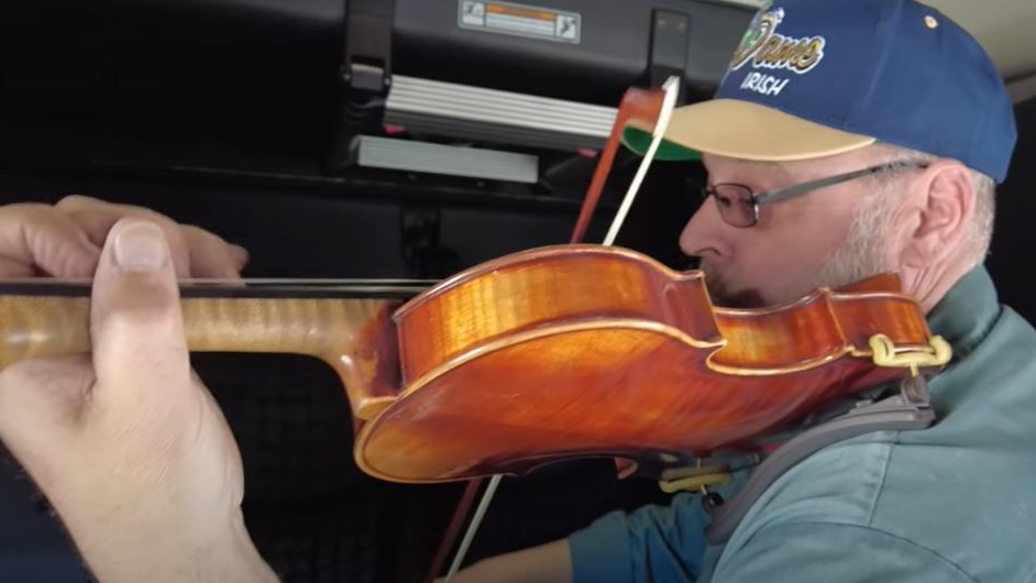 Crete Carrier driver Brian Lips makes use of his off-duty time in a uniquely creative way&mdash;he plays the violin.