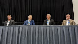 Matthew Spears of Cummins, left, Johan Agebrand of Volvo Trucks North America, Ron Hall of C.R. England, and Dan Porterfield of Covenant Logistics at American Trucking Associations&apos; Management Conference &amp; Exhibition 2022 in San Diego.