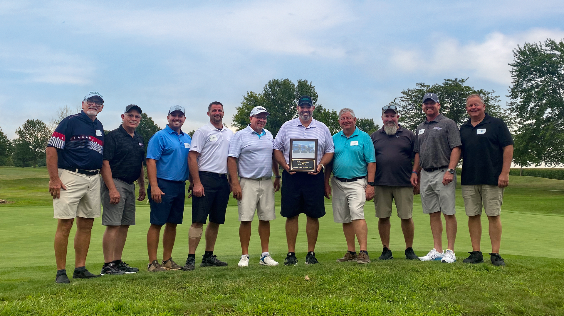 From left to right are Tony Mercurio, VP of sales at Craftsmen Utility Trailer; Doug Underwood, tire manager at Dot Transportation; Kyle Martin, regional sales manager at Utility Trailer Manufacturing; Aaron McCrady, service representative at Craftsmen Utility; Kevin Buss, director of fleet maintenance at Dot; Lou Helmsing, president of Craftsmen Utility; Joe Helmsing, chairman of Craftsmen Utility; Dave Hamilton, parts and warranty manager at Dot Transportation; J.R. Wasson, director of service at Craftsmen Utility; and Alan Shopman, trailer maintenance manager at Dot.