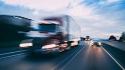 semi truck sharing road with passenger car semi truck sharing road with passenger car