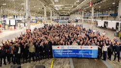 Employees celebrate the opening of Canada&rsquo;s first full-scale EV plant, which will build BrightDrop Zevo electric delivery vans.