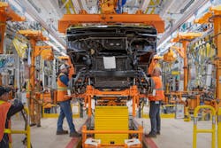 Employees work on the BrightDrop Zevo 600 production line at the CAMI assembly plant in Ingersoll, Ontario. Employees work on the BrightDrop Zevo 600 production line at the CAMI assembly plant in Ingersoll, Ontario.