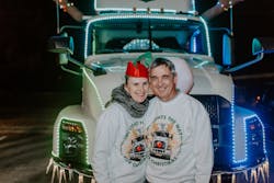 IMC driver Kolos Varga and his wife, Natalia, drove a decorated IMC Cos. truck in the Collierville parade.