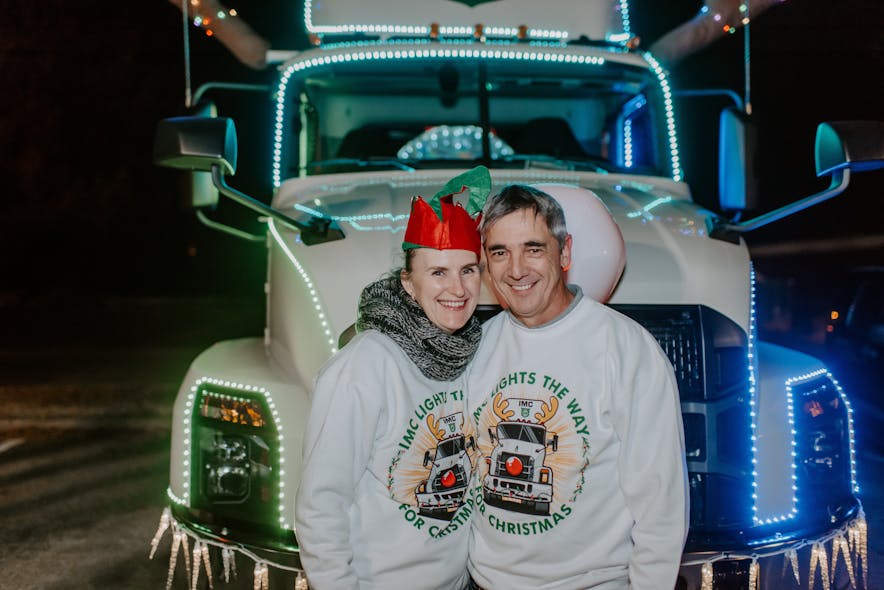IMC driver Kolos Varga and his wife, Natalia, drove a decorated IMC Cos. truck in the Collierville parade.