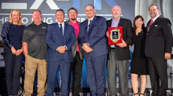 From left to right are Karin De Bondt, president of Thermo King Americas; David Smith, telematics manager for Thermo King Midwest; Don Reinhart, general manager of Thermo King Midwest North; Glenn Bartholomew, Thermo King Midwest CFO; Steve Bach, GM of aftermarket products and bus at Thermo King Americas; Tom Lantrip, executive VP of Thermo King Midwest; Carrie-Ann Flank, VP of sales at Thermo King Americas; and Mark Nyman, channel excellence leader for Thermo King Americas.