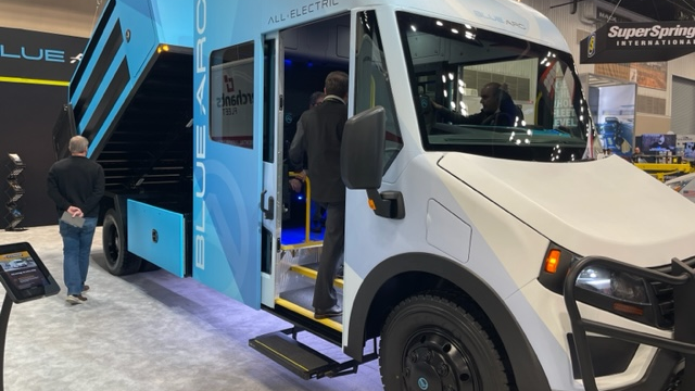 The new Blue Arc Class 5 delivery van with a unique 'landscaping' load upfit on the show floor of Work Truck Week 2023 in Indianapolis.