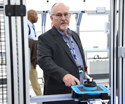 Doug Reauso, Phillips Connect project manager, highlights the company's new automated production lines inside a 21,000-sq.-ft. 'safe room.' Doug Reauso, Phillips Connect project manager, highlights the company's new automated production lines inside a 21,000-sq.-ft. 'safe room.'