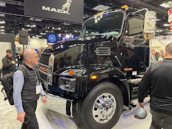 Work Truck Week 2023 attendees check out the freshly unveiled Mack MD Electric on March 8 on the show floor in Indianapolis.