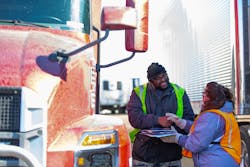 Two Truckers Signing Papers Sentry Insurance Two Truckers Signing Papers Sentry Insurance