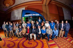 Werner Chairman, President, and CEO Derek Leathers and a group of professional drivers are pictured in front of Werner's new Operation Freedom 23 truck during its annual Holiday Gala. Werner Chairman, President, and CEO Derek Leathers and a group of professional drivers are pictured in front of Werner's new Operation Freedom 23 truck during its annual Holiday Gala.