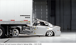 In a simulated rear underride crash, a sedan slides under the back of a tractor-trailer. In a simulated rear underride crash, a sedan slides under the back of a tractor-trailer.