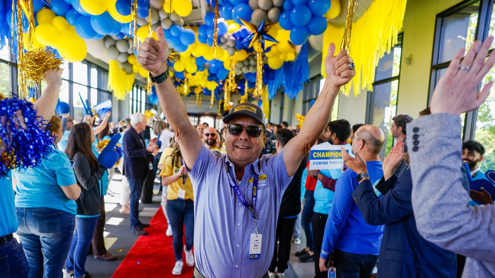 J.B. Hunt Intermodal driver Tony Broussard, the company&rsquo;s second driver to achieve five million safe miles, participates in the Million Mile Walk of Fame at J.B. Hunt headquarters.