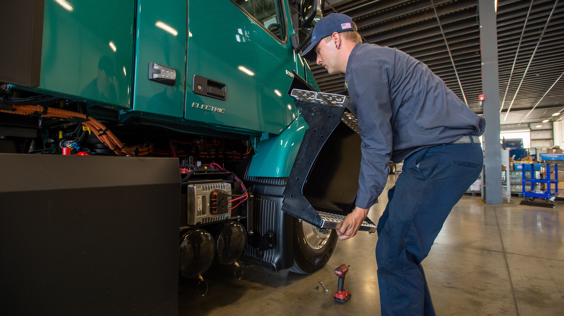 Vnr Electric Technician Removing Battery Cover 6160311f2a861 64501fdab0e05