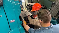 Technicians perform maintenance and repairs on customers’ Volvo VNR Electric trucks at one of the OEM’s certified EV dealerships. Technicians perform maintenance and repairs on customers’ Volvo VNR Electric trucks at one of the OEM’s certified EV dealerships.