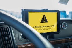 A 'sudden-slowdown' alert from the Drivewyze Safety+ system. A 'sudden-slowdown' alert from the Drivewyze Safety+ system.