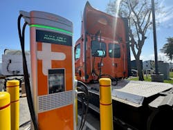 Dealer Velocity Truck Centers in Fontana, California, houses an area for EVs like this Freightliner eCascadia, run by Schneider, to charge up before getting back to work.