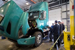 Technicians at Camions Volvo Montreal complete their required training on the Volvo VNR Electric as part of the Volvo Trucks EV Certified dealership designation.