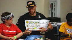 George Kittle, tight end for the San Francisco 49ers, reads to kids during a literacy program in partnership with Bridgestone during the TEU Summit 2023 George Kittle, tight end for the San Francisco 49ers, reads to kids during a literacy program in partnership with Bridgestone during the TEU Summit 2023