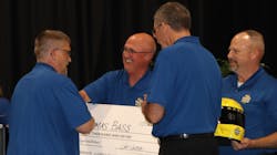 Penske technician Tommy Bass is congratulated after winning the company's 2023 Tech Showdown. Penske technician Tommy Bass is congratulated after winning the company's 2023 Tech Showdown.