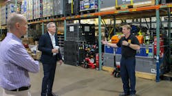 Lt. Bill Lamont (right), warehouse manager of Virginia Task Force-1, offers a tour of the group's facility to ATA President and CEO Chris Spear (middle) and Trucking Cares Foundation President John Lynch (left) following TCF's $25,000 donation to the urban search and rescue organization. Lt. Bill Lamont (right), warehouse manager of Virginia Task Force-1, offers a tour of the group's facility to ATA President and CEO Chris Spear (middle) and Trucking Cares Foundation President John Lynch (left) following TCF's $25,000 donation to the urban search and rescue organization.