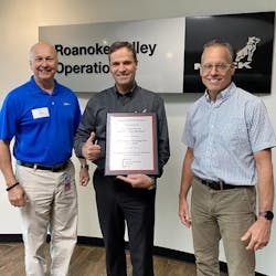 Roanoke Valley Operations (RVO) in Virginia, where all Mack Trucks medium-duty vehicles are assembled, is now certified and participating in Appalachian Power Company’s 100% Renewable Wind-Water-Sunlight (WWS) Service. Pictured left to right is Donald P. Pole, Appalachian Power key account manager, Antonio Servidoni, vice president at RVO, and Tim Fretwell, RVO facilities manager. Roanoke Valley Operations (RVO) in Virginia, where all Mack Trucks medium-duty vehicles are assembled, is now certified and participating in Appalachian Power Company’s 100% Renewable Wind-Water-Sunlight (WWS) Service. Pictured left to right is Donald P. Pole, Appalachian Power key account manager, Antonio Servidoni, vice president at RVO, and Tim Fretwell, RVO facilities manager.