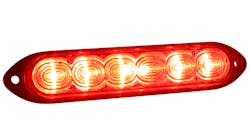 A Grote auxiliary strobe light, lit red A Grote auxiliary strobe light, lit red