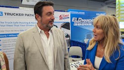 Trucker Path&apos;s Chris Oliver, left, and Women in Motion&apos;s Brenda Neville discuss their partnership during American Trucking Associations&apos; 2023 Management Conference &amp; Exhibition in Austin, Texas.