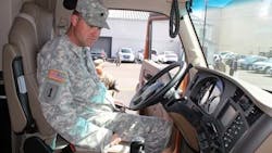 Spec. Charles Bailes gets a feel for sitting in the driver seat of a Kenworth T680 76-inch sleeper during a hiring summit at Joint Base Lewis-McChord (JBLM) in 2015. Spec. Charles Bailes gets a feel for sitting in the driver seat of a Kenworth T680 76-inch sleeper during a hiring summit at Joint Base Lewis-McChord (JBLM) in 2015.