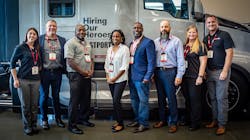 Transition Trucking: Driving for Excellence finalists and Kenworth staff. From left: Brianna Potthast, Kenworth on-highway marketing manager; Todd Kraus, finalist; Ondrae Meyers, finalist; Jessica White, finalist; LaTravis Wilcox, finalist; Brandon Meredith, finalist; Cara Howes, Kenworth assistant director of marketing; and Kyle Kimball, Kenworth director of marketing Transition Trucking: Driving for Excellence finalists and Kenworth staff. From left: Brianna Potthast, Kenworth on-highway marketing manager; Todd Kraus, finalist; Ondrae Meyers, finalist; Jessica White, finalist; LaTravis Wilcox, finalist; Brandon Meredith, finalist; Cara Howes, Kenworth assistant director of marketing; and Kyle Kimball, Kenworth director of marketing