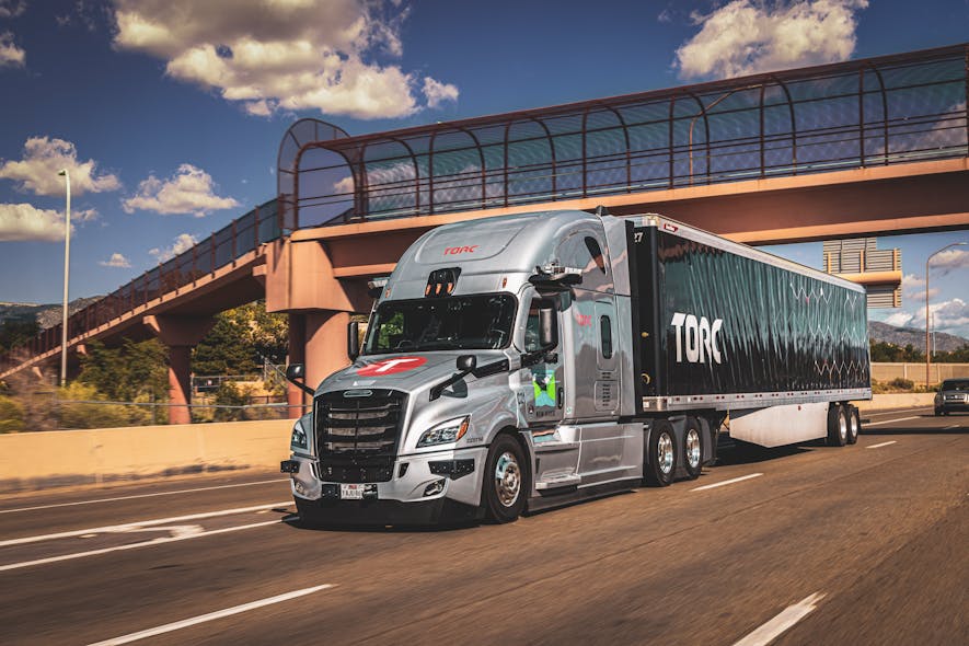 A Torc Robotics Freightliner Cascadia operates on a New Mexico highway.