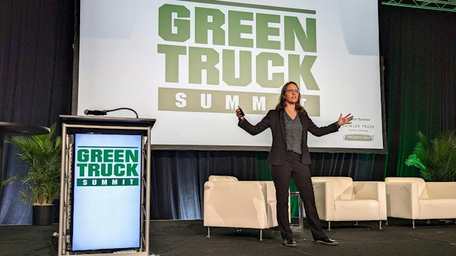 Mary Aufdemberg, GM of product strategy and market development for Daimler Truck North America, gives the keynote address during the the 2024 Green Truck Summit during NTEA's Work Truck Week in Indianapolis.
