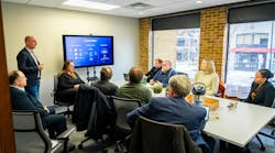 Yoav Levy, Upstream&apos;s cofounder and CEO, addressing a group of automotive journalists and Justine Johnson (far right), Michigan&rsquo;s chief mobility officer, at the company&apos;s U.S. headquarters in Ann Arbor.
