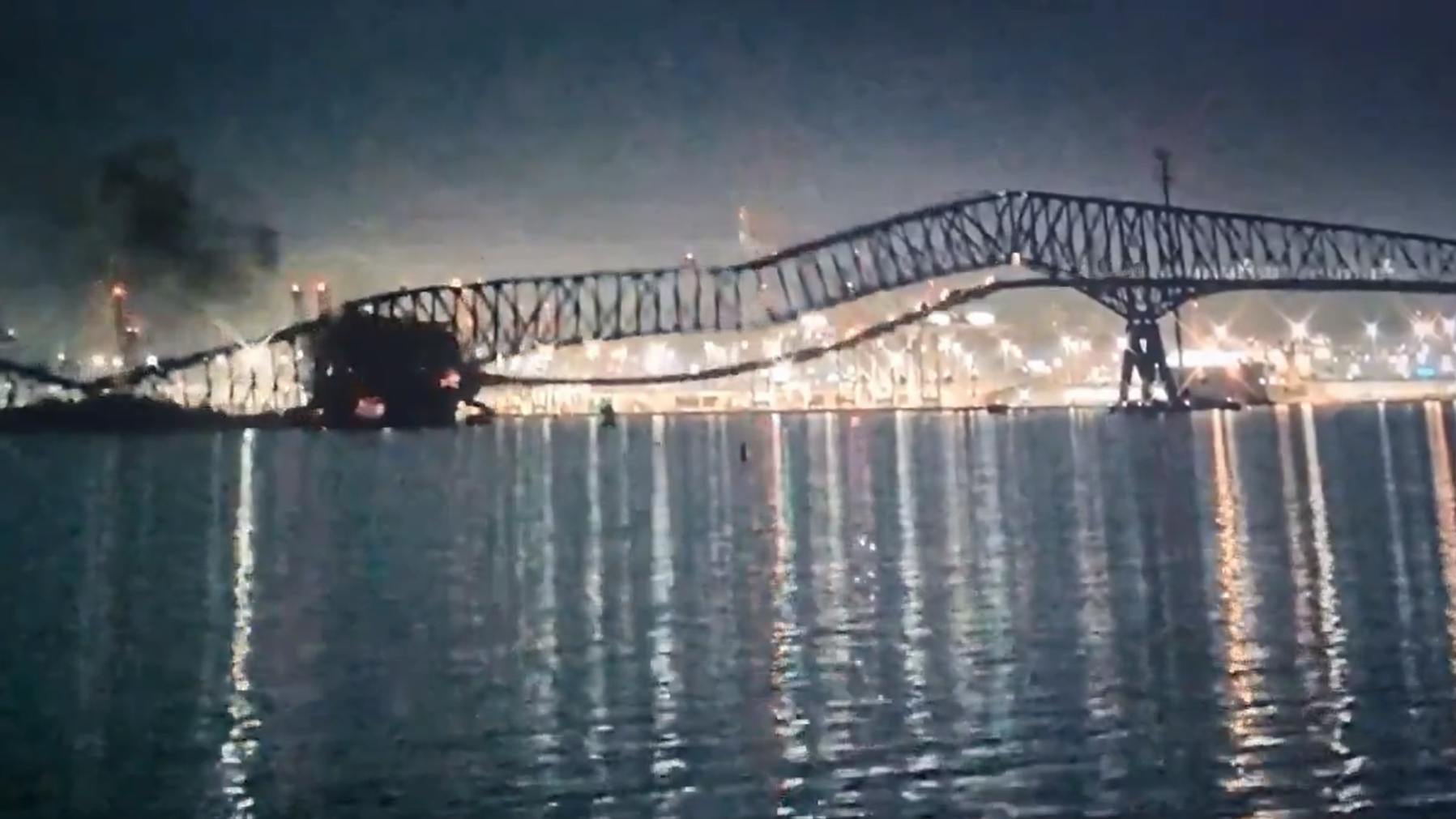 Baltimore's Francis Scott Key Bridge crumbles after container ship strikes it early March 26, 2024.