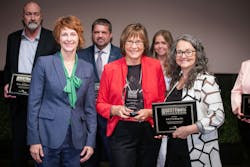 K&J Trucking won Best Overall Fleet in the small carrier category. Shelley Schipper (center), president of K&J Trucking, accepted the award. K&J Trucking won Best Overall Fleet in the small carrier category. Shelley Schipper (center), president of K&J Trucking, accepted the award.