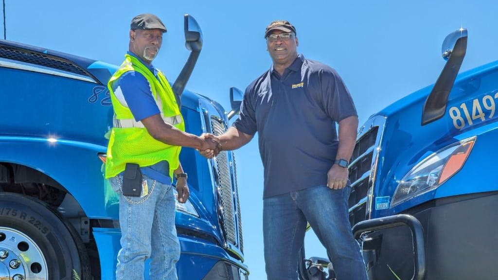 Werner Enterprises drivers, Marvin and Ricky, proudly showcased their Operation Freedom Trucks at the Nebraska Vietnam Veterans Memorial Grand Opening.