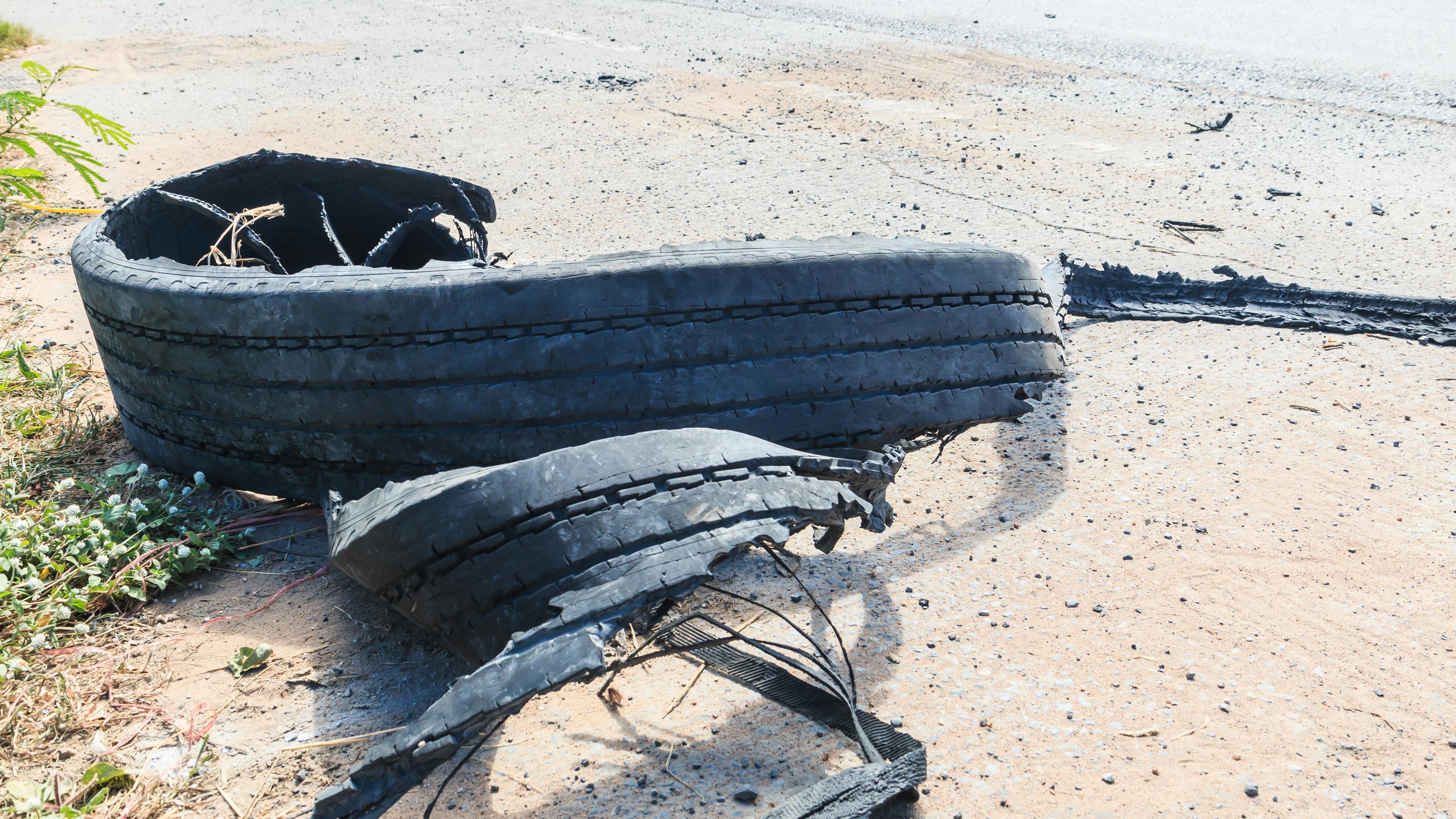 A tire tread on the side of the highway after a summer blowout. When temperatures rise, trucks can face more tire problems on U.S. highways.