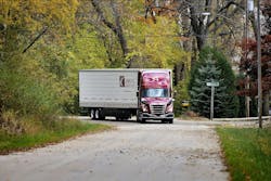 An America's Service Line tractor-trailer operates. An America's Service Line tractor-trailer operates.