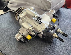 A new Cummins fuel pump, with opposing pistons, better balances its camshaft. A new Cummins fuel pump, with opposing pistons, better balances its camshaft.