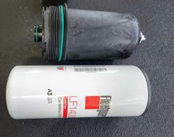 A reusable oil filter housing makes for a less wasteful oil change. A reusable oil filter housing makes for a less wasteful oil change.