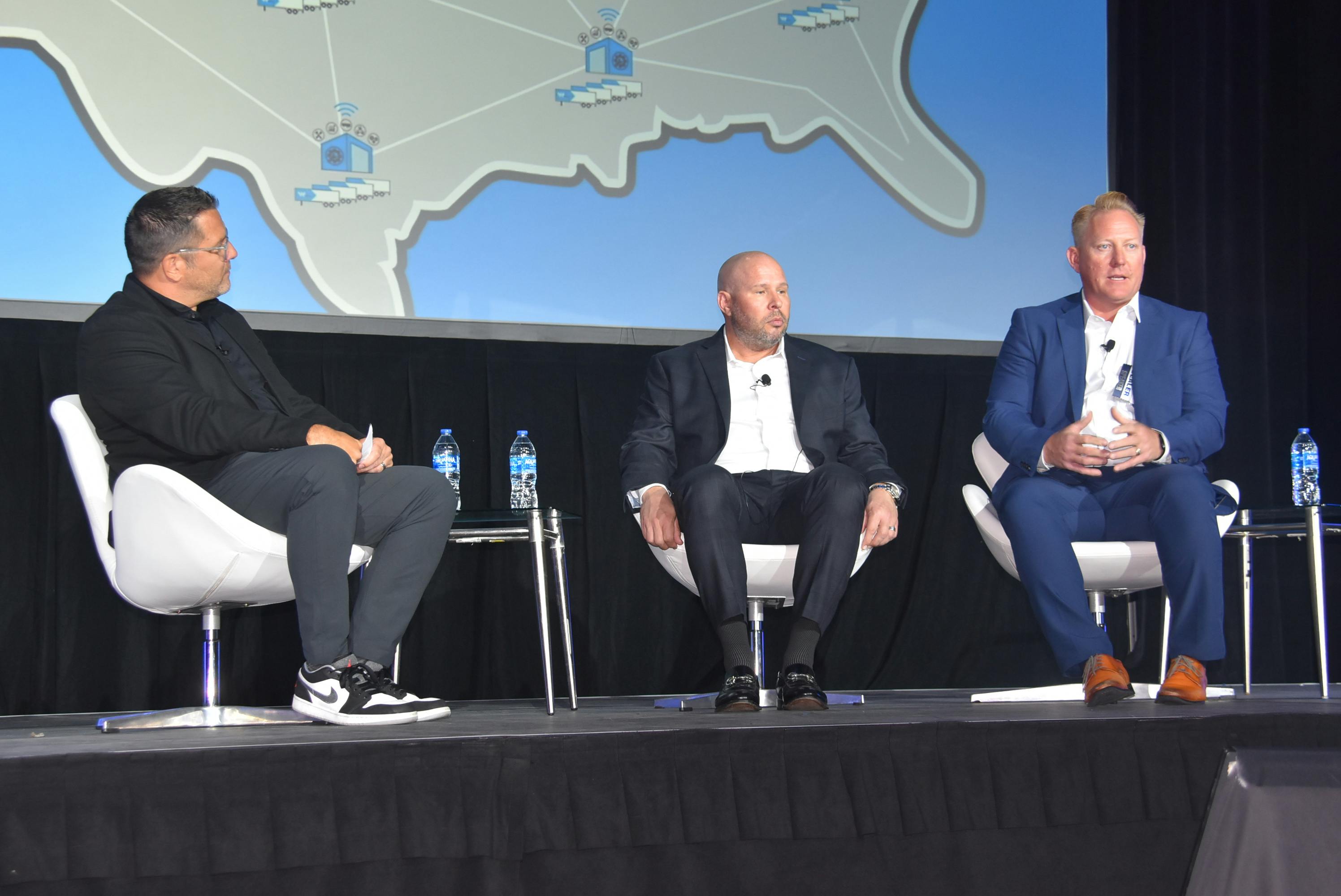 From left, Wabash Marketplace Operation VP Cory O&rsquo;Brien, Loadsmith Founder and CEO Brett Suma, and Intermountain Trailer President Travis &ldquo;TJ&rdquo; Johnson discuss the opportunities available through the Wabash TaaS program.