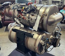 Pictured is a prototype of the SCR system for the new Cummins X15 diesel engine. The large cylinders are the SCR housings, where DEF and a catalyst react with NOx. Pictured is a prototype of the SCR system for the new Cummins X15 diesel engine. The large cylinders are the SCR housings, where DEF and a catalyst react with NOx.