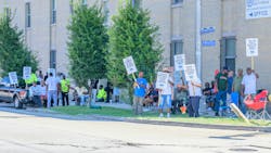 Striking dock workers near the Port of New Orleans on October 2. Striking dock workers near the Port of New Orleans on October 2.