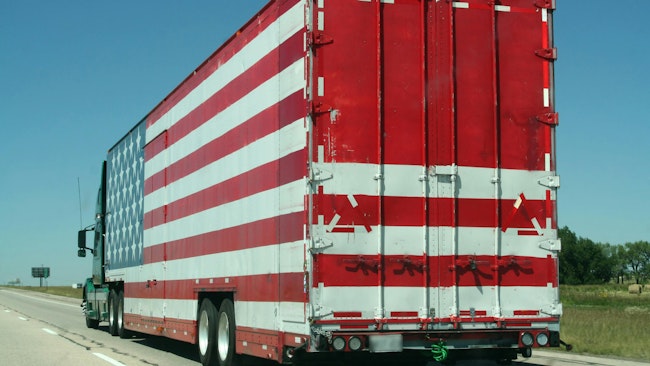 heavy-duty trailer painted to resemble american flag