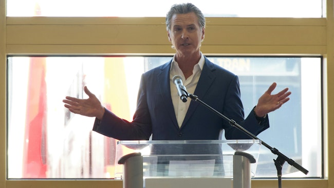 Governor Gavin Newsom speaking at a press event to celebrate Caltrain's first electric train ride on Aug. 10, 2024.