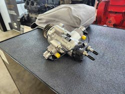 A new fuel pump, with opposing pistons, better balances its camshaft. A new fuel pump, with opposing pistons, better balances its camshaft.